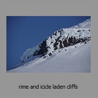 rime and icicle laden cliffs